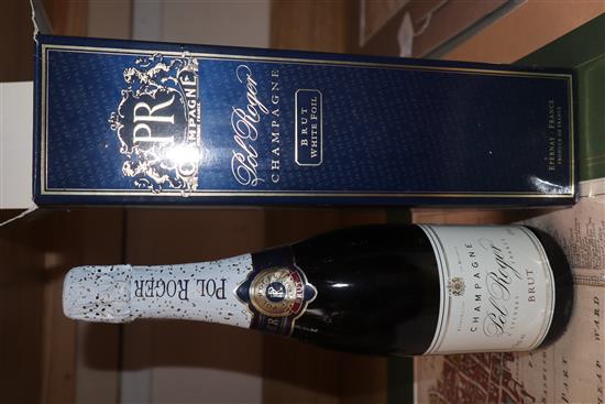 A magnum of Mouton cadet, 2003, a presentation box of three Spanish riojas, one Ch.la roseliere, 2006 and one Pol Roger champagne